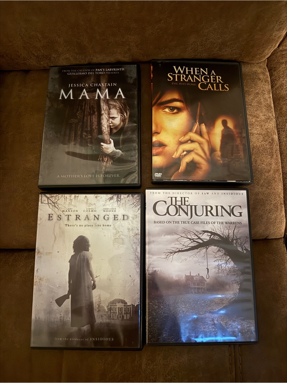 Mama, The Estranged, When a Stranger Calls, and The Conjuring DVDs